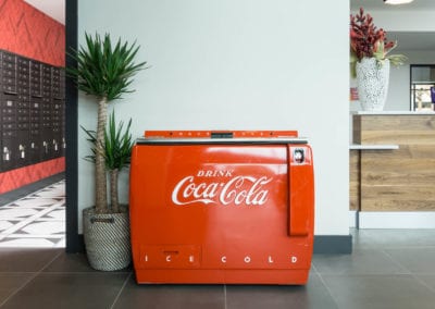 coca cola refreshement station in leasing office at the red apartments
